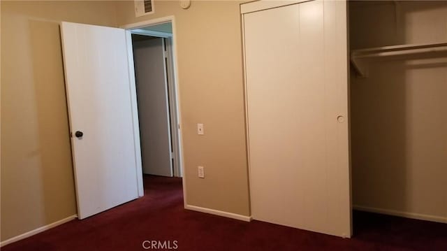 414 Nobel Ave Unit D, Santa Ana, CA 92707 - unfurnished bedroom with dark colored carpet, a closet, and baseboards