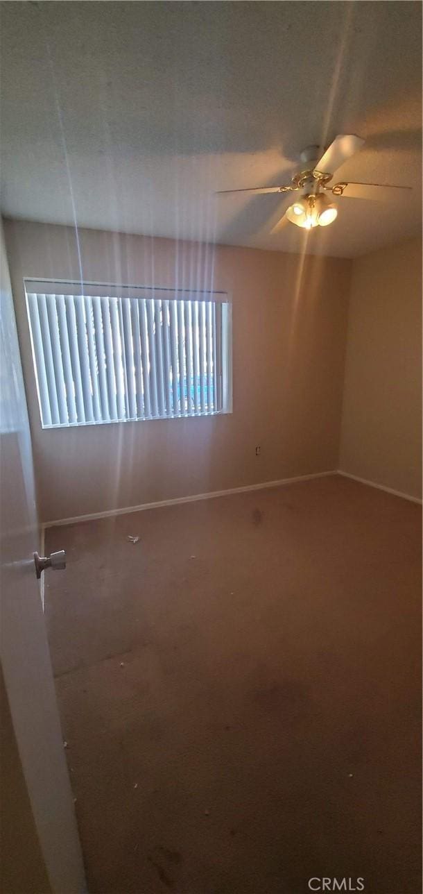414 Nobel Ave Unit D, Santa Ana, CA 92707 - spare room featuring ceiling fan, baseboards, and carpet flooring