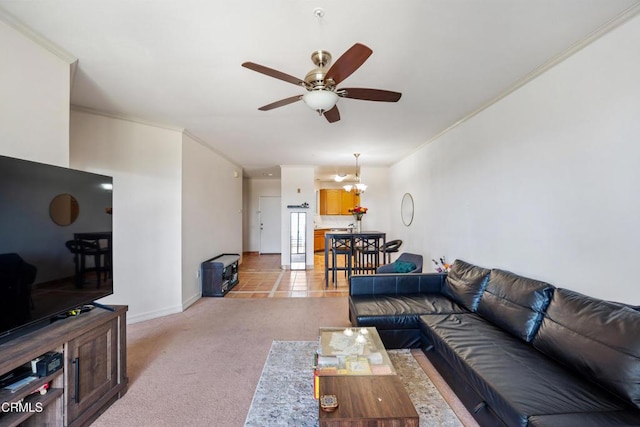 living area featuring baseboards, light carpet, crown molding, and ceiling fan with notable chandelier