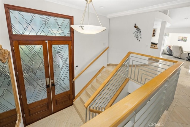 16449 Ladona Cir, Huntington Beach, CA 92649 - entryway featuring light tile patterned floors, french doors, and crown molding
