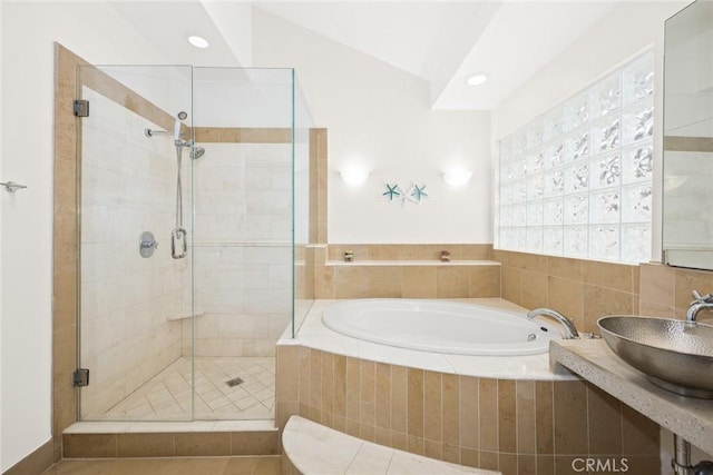 16449 Ladona Cir, Huntington Beach, CA 92649 - bathroom featuring a sink, a garden tub, a shower stall, recessed lighting, and vaulted ceiling