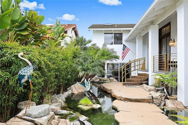 16449 Ladona Cir, Huntington Beach, CA 92649 - view of yard with a small pond