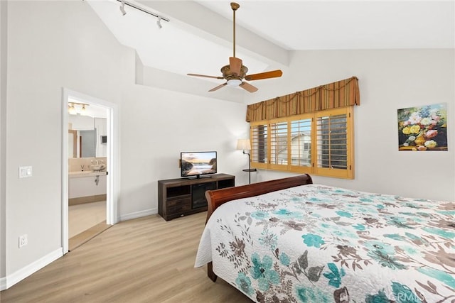 16449 Ladona Cir, Huntington Beach, CA 92649 - bedroom with light wood-type flooring, baseboards, ensuite bath, and rail lighting