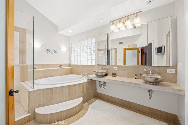 16449 Ladona Cir, Huntington Beach, CA 92649 - full bathroom with a garden tub, tile patterned flooring, and double vanity