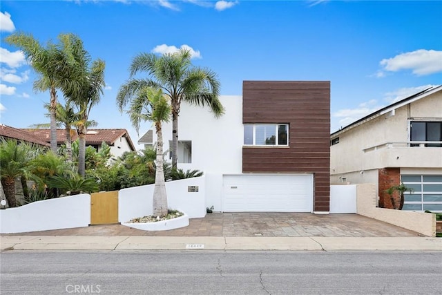 16449 Ladona Cir, Huntington Beach, CA 92649 - view of front of property featuring an attached garage and driveway