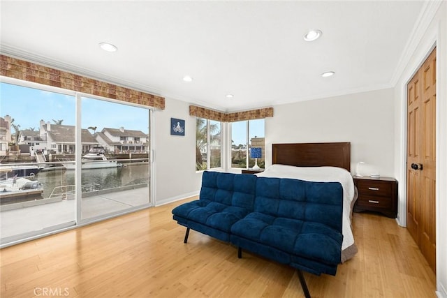 16449 Ladona Cir, Huntington Beach, CA 92649 - bedroom with access to outside, crown molding, wood finished floors, recessed lighting, and baseboards