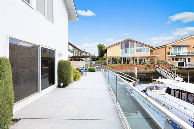 16449 Ladona Cir, Huntington Beach, CA 92649 - dock featuring a residential view