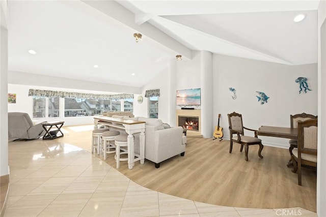 16449 Ladona Cir, Huntington Beach, CA 92649 - tiled living area featuring a glass covered fireplace and recessed lighting