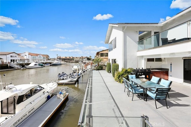 16449 Ladona Cir, Huntington Beach, CA 92649 - dock featuring a water view, a sink, and a patio