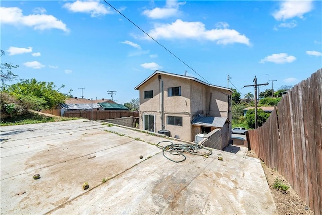 1116 Herbert Ave, Los Angeles, CA 90063 - back of property with a patio, a fenced backyard, and stucco siding