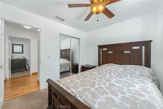 1116 Herbert Ave, Los Angeles, CA 90063 - bedroom featuring light carpet, a closet, and a ceiling fan