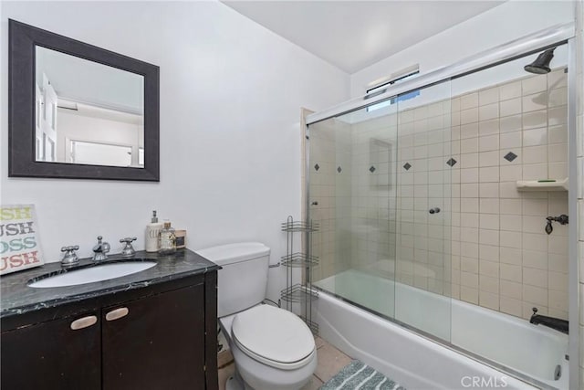1116 Herbert Ave, Los Angeles, CA 90063 - full bath featuring vanity, combined bath / shower with glass door, toilet, and tile patterned flooring