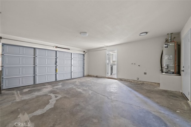 garage featuring secured water heater