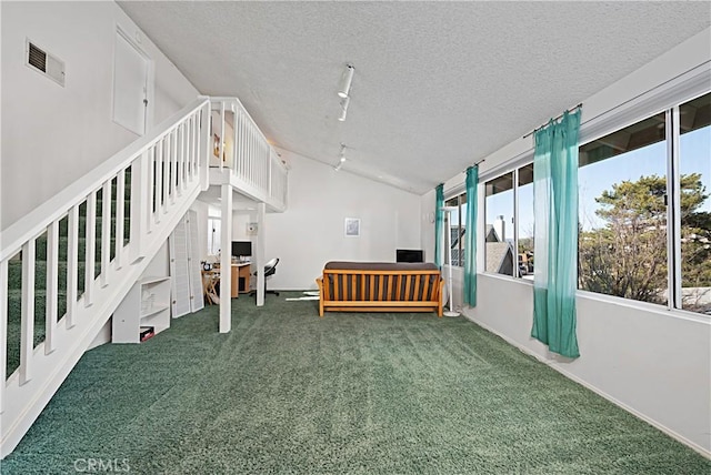 2332 Mccrea Rd, Thousand Oaks, CA 91362 - unfurnished living room featuring track lighting, carpet, a textured ceiling, stairway, and lofted ceiling