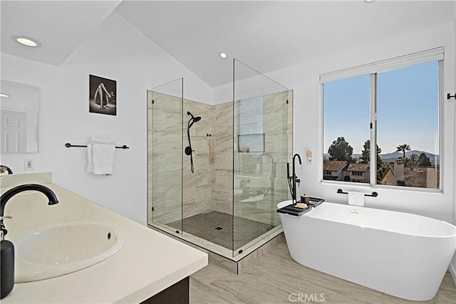 2332 Mccrea Rd, Thousand Oaks, CA 91362 - full bathroom with a shower stall, a soaking tub, double vanity, recessed lighting, and vaulted ceiling