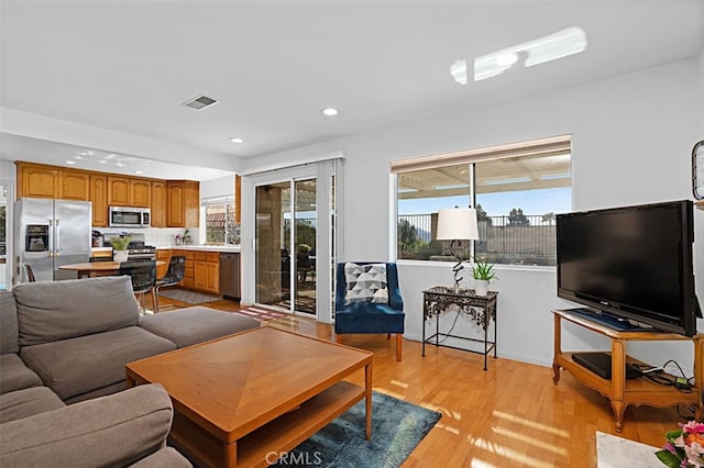 2332 Mccrea Rd, Thousand Oaks, CA 91362 - living area with light wood-type flooring, recessed lighting, and baseboards