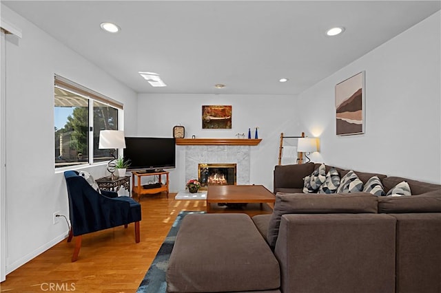 2332 Mccrea Rd, Thousand Oaks, CA 91362 - living room with wood finished floors, a fireplace, recessed lighting, and baseboards
