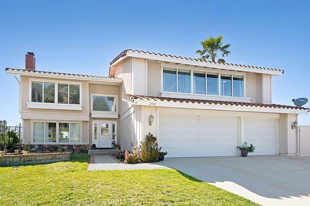 2332 Mccrea Rd, Thousand Oaks, CA 91362 - view of front of house with a chimney, driveway, a garage, and a tiled roof
