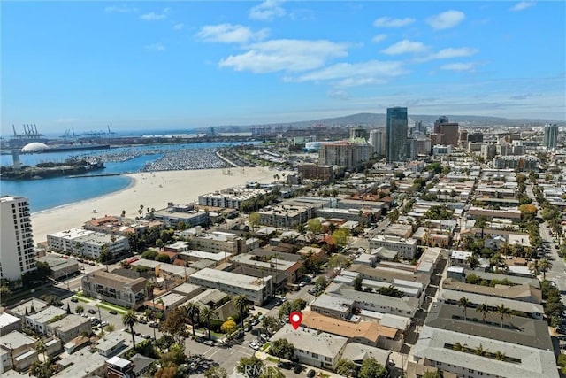 drone / aerial view with a water view and a view of city