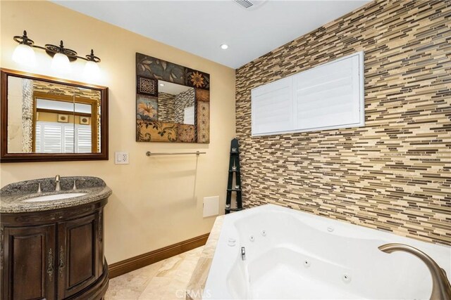 401 Holmwood Dr, Newport Beach, CA 92663 - full bathroom featuring baseboards, a jetted tub, vanity, and recessed lighting