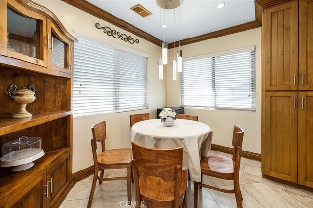 401 Holmwood Dr, Newport Beach, CA 92663 - dining room featuring baseboards, ornamental molding, inlaid floor details, and light tile patterned flooring