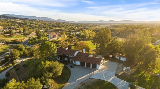 drone / aerial view featuring a mountain view