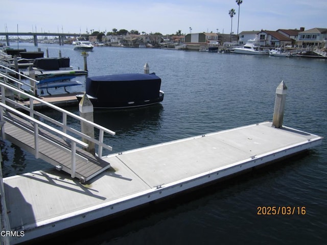 dock area featuring a water view