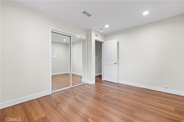 3476 Linda Vista Rd, Glendale, CA 91206 - unfurnished bedroom with a closet, visible vents, light wood finished floors, baseboards, and recessed lighting