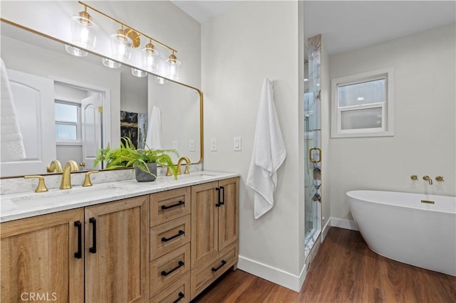 3476 Linda Vista Rd, Glendale, CA 91206 - bathroom with double vanity, a sink, a stall shower, and wood finished floors