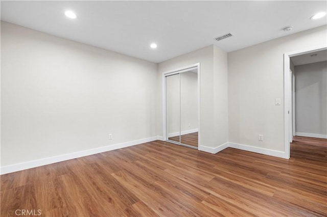 3476 Linda Vista Rd, Glendale, CA 91206 - unfurnished bedroom with a closet, wood finished floors, baseboards, visible vents, and recessed lighting