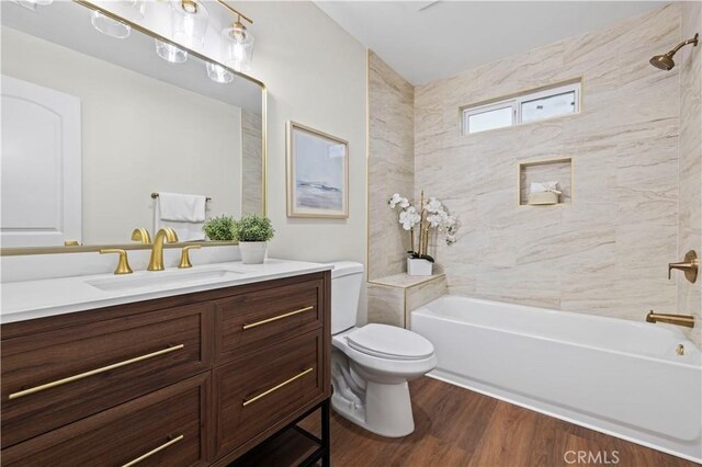 3476 Linda Vista Rd, Glendale, CA 91206 - bathroom with shower / bathing tub combination, toilet, wood finished floors, and vanity