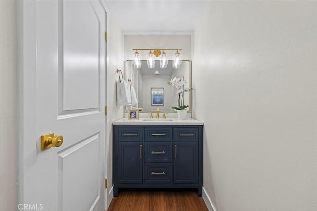 3476 Linda Vista Rd, Glendale, CA 91206 - bathroom with baseboards, wood finished floors, and vanity