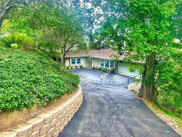 3476 Linda Vista Rd, Glendale, CA 91206 - single story home with driveway and a tile roof