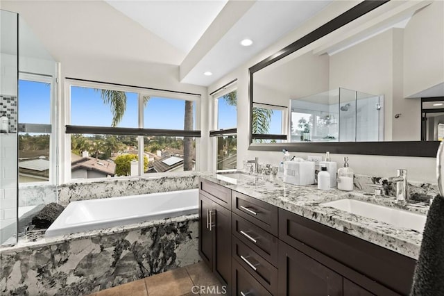17 Ridgerock, Laguna Niguel, CA 92677 - full bath with lofted ceiling, a stall shower, a garden tub, tile patterned floors, and double vanity