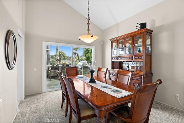 17 Ridgerock, Laguna Niguel, CA 92677 - dining area featuring light carpet, high vaulted ceiling, and baseboards