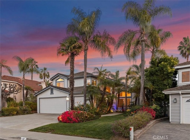 17 Ridgerock, Laguna Niguel, CA 92677 - traditional-style house featuring concrete driveway, a garage, and a lawn