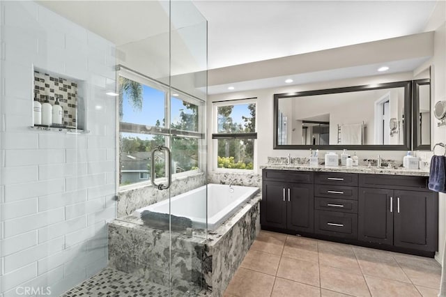 17 Ridgerock, Laguna Niguel, CA 92677 - bathroom featuring a garden tub, tile patterned floors, double vanity, a tile shower, and recessed lighting