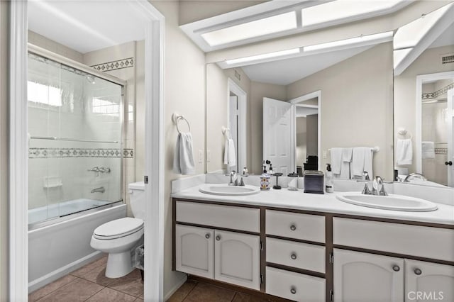 17 Ridgerock, Laguna Niguel, CA 92677 - full bathroom featuring tile patterned flooring, double vanity, toilet, and combined bath / shower with glass door