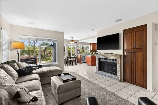17 Ridgerock, Laguna Niguel, CA 92677 - living area featuring light tile patterned flooring, a ceiling fan, and a fireplace