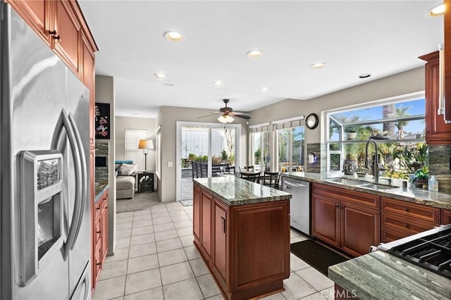 17 Ridgerock, Laguna Niguel, CA 92677 - kitchen with appliances with stainless steel finishes, a sink, recessed lighting, a ceiling fan, and a center island
