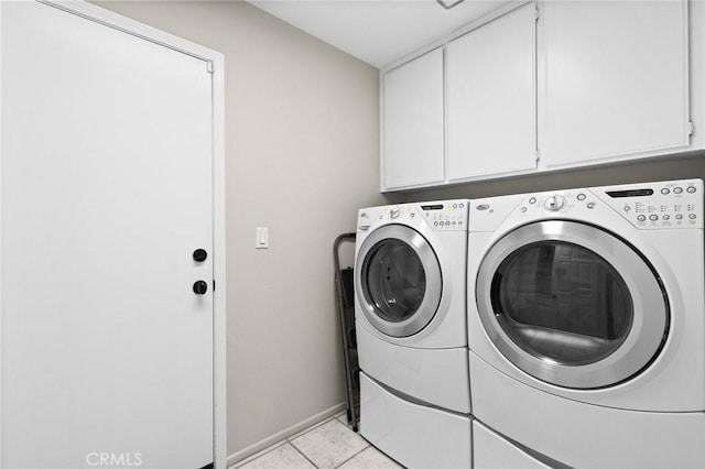 17 Ridgerock, Laguna Niguel, CA 92677 - laundry room with independent washer and dryer, cabinet space, light tile patterned floors, and baseboards