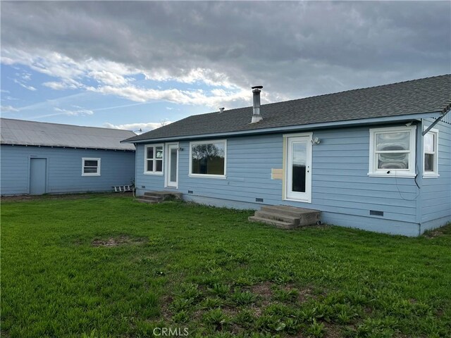 11122 Schafer Ave, Los Molinos, CA 96055 - rear view of house featuring crawl space, entry steps, a lawn, and a shingled roof