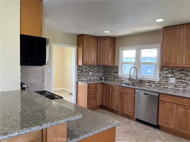 11122 Schafer Ave, Los Molinos, CA 96055 - kitchen featuring dishwasher, a sink, dark stone countertops, brown cabinetry, and light tile patterned flooring