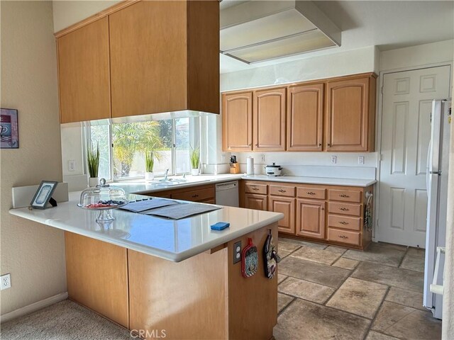 1050 Ginger Cir, Corona, CA 92879 - kitchen featuring light countertops, a sink, a peninsula, and white appliances