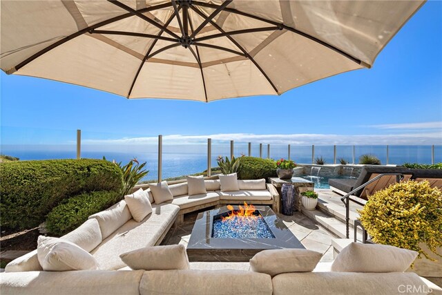 31821 Monarch Crst, Laguna Niguel, CA 92677 - view of patio / terrace featuring an outdoor fire pit and a water view