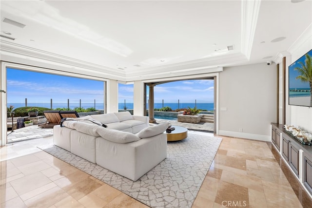 31821 Monarch Crst, Laguna Niguel, CA 92677 - living area with ornamental molding, a tray ceiling, and light stone finish flooring