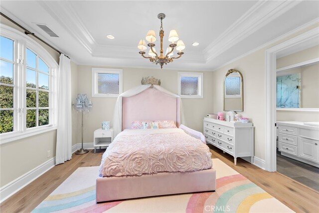 31821 Monarch Crst, Laguna Niguel, CA 92677 - bedroom with a raised ceiling, ornamental molding, a chandelier, wood finished floors, and recessed lighting
