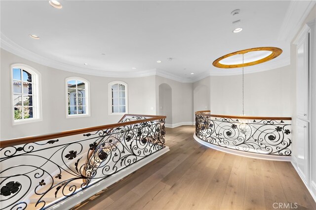 31821 Monarch Crst, Laguna Niguel, CA 92677 - hallway featuring recessed lighting, hardwood / wood-style flooring, plenty of natural light, an upstairs landing, and arched walkways