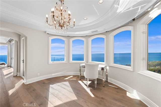 31821 Monarch Crst, Laguna Niguel, CA 92677 - home office featuring arched walkways, a water view, hardwood / wood-style flooring, a chandelier, and recessed lighting