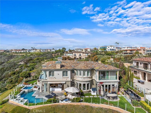 31821 Monarch Crst, Laguna Niguel, CA 92677 - rear view of house with stucco siding, a fire pit, a patio, and french doors
